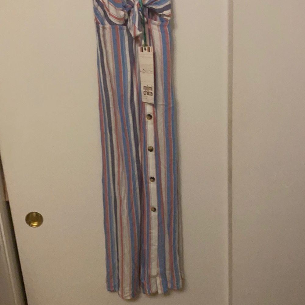 Mimi chica size small. Never worn